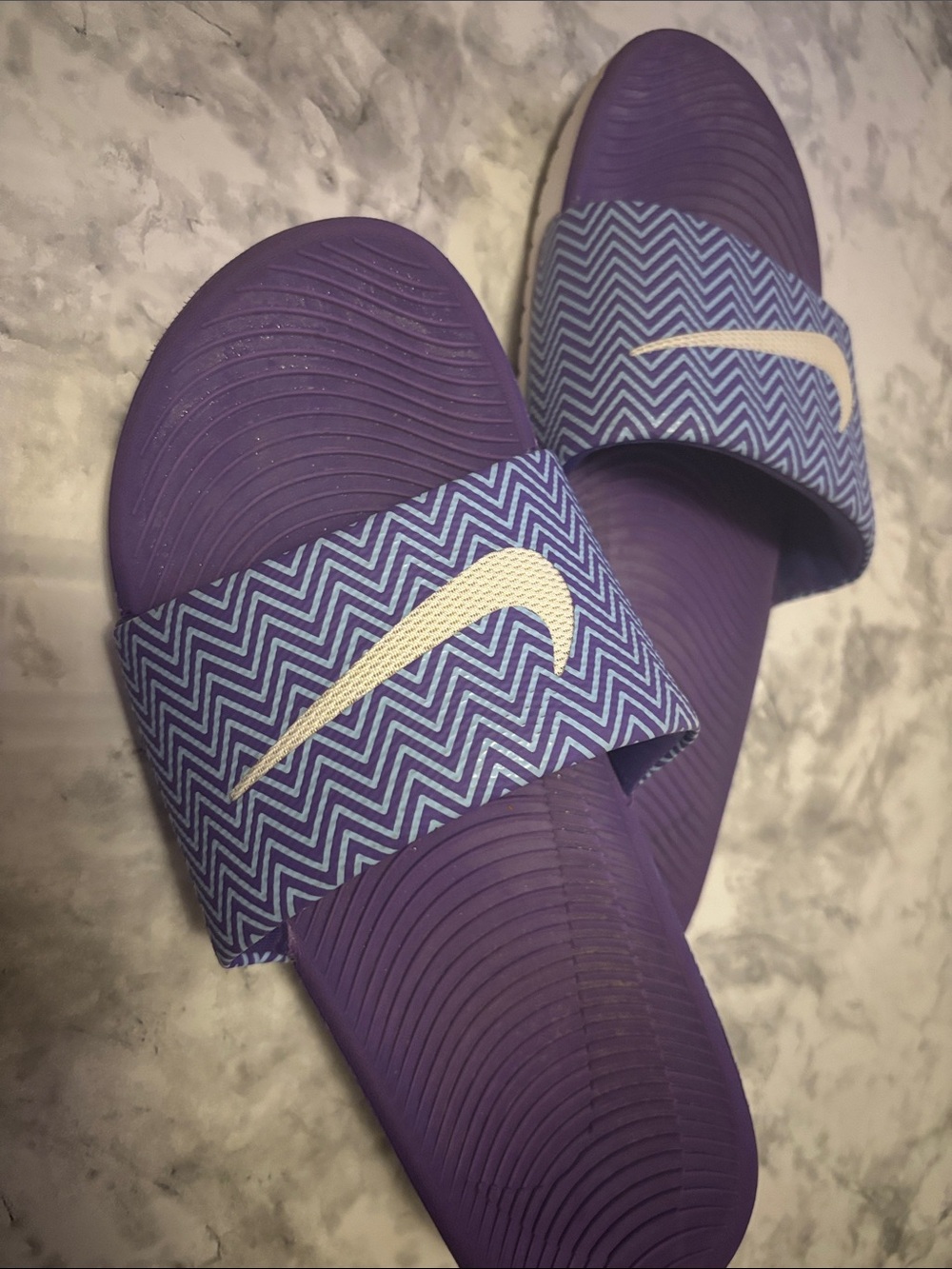 Nike Purple Slide Sandals with Blue Chevron Strap and White Swoosh